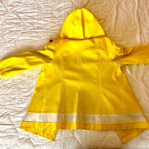 Bright yellow, reflective rain coat with hood. Medium Petite. Lightly worn.